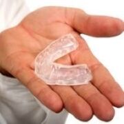 mouth guard when teething, which is a symptom of the presence of parasites